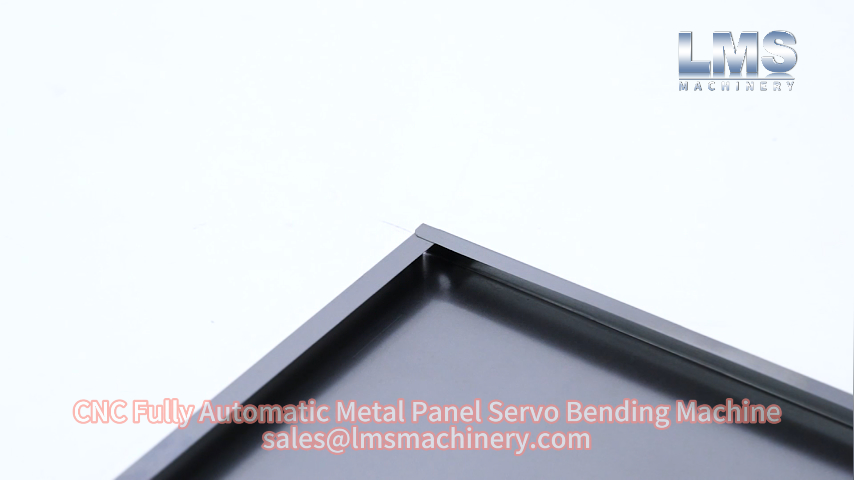 Close-up detail of a finished bent metal panel edge